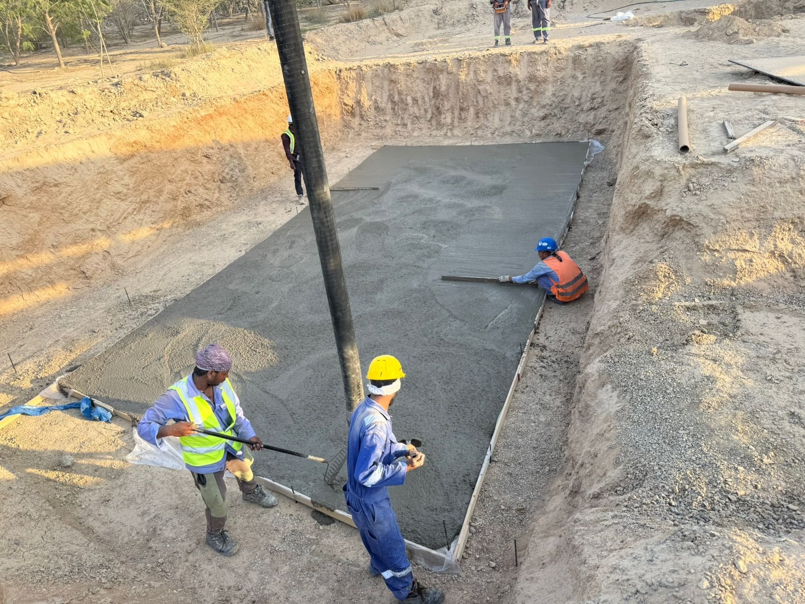 Finishing a slab behind the pump line