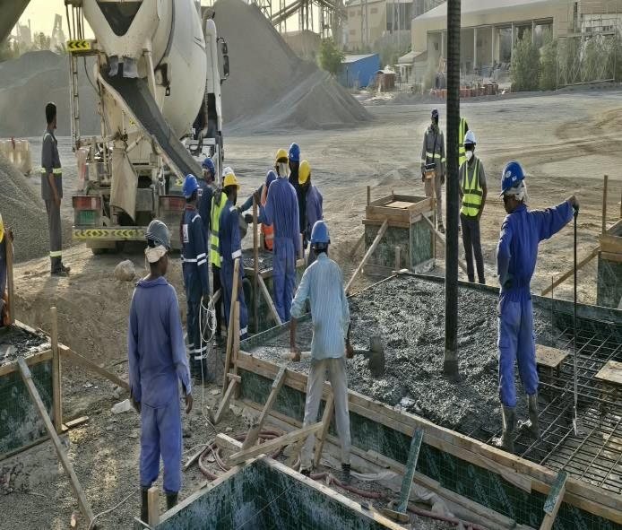 Pour crew working the slab